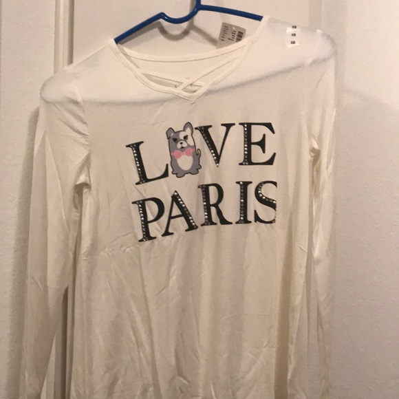 Cream colored long sleeved t-shirt from Justice. - Picture 1 of 2